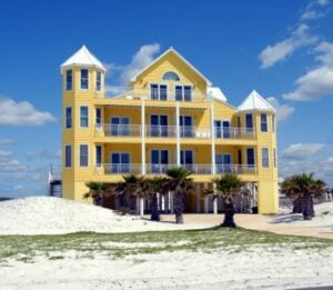 yellow Multi-Unit building on beach